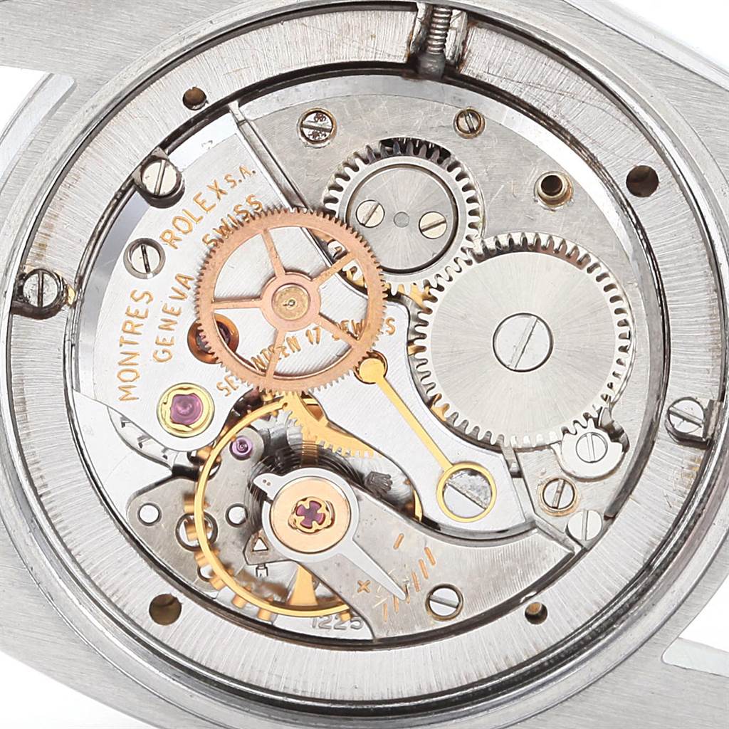 The image shows the internal mechanism of a Vintage Collection Rolex watch from a top-down angle.