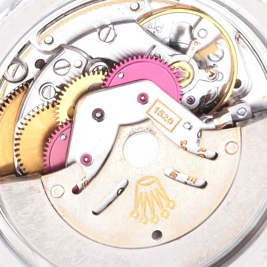 This image shows the internal mechanics and gears of a Rolex Vintage Collection 5513 Men's Stainless Steel Black Dial 5513 Men's Stainless Steel Black Dial watch, highlighting the intricate movement parts.