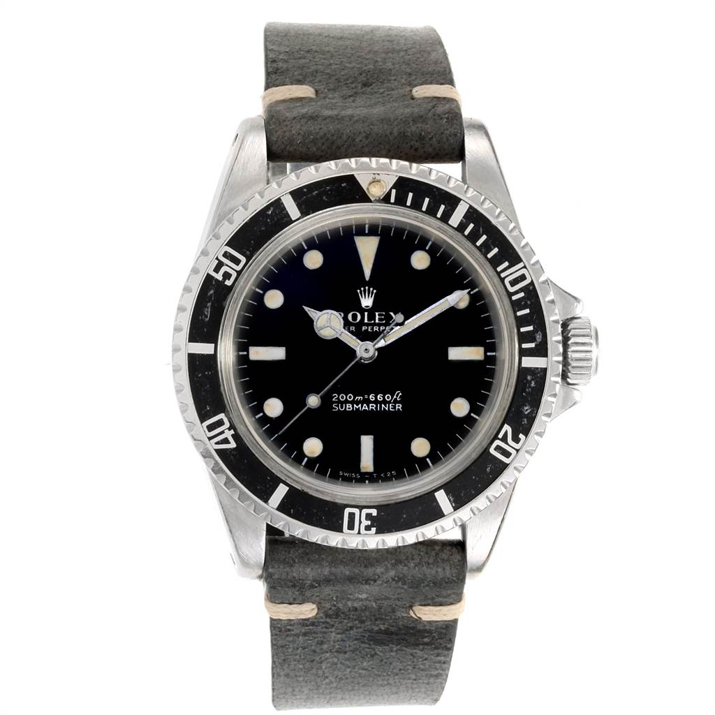 The image shows a front view of a Vintage Collection model Rolex watch, displaying its face, bezel, and leather strap.
