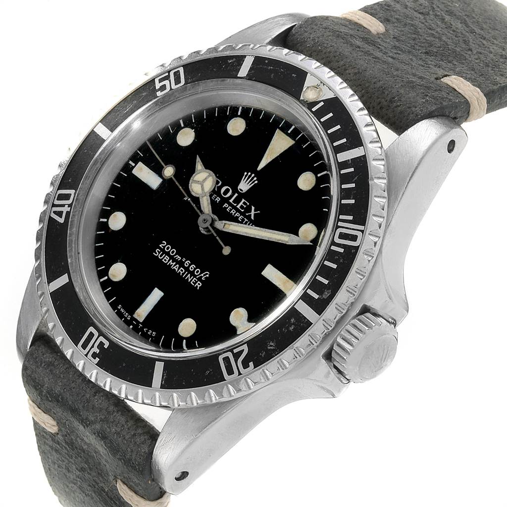 The image shows a Rolex Vintage Collection 5513 Men's Stainless Steel Black Dial 5513 Men's Stainless Steel Black Dial Submariner watch at an angled view, highlighting the watch face, bezel, crown, and strap.