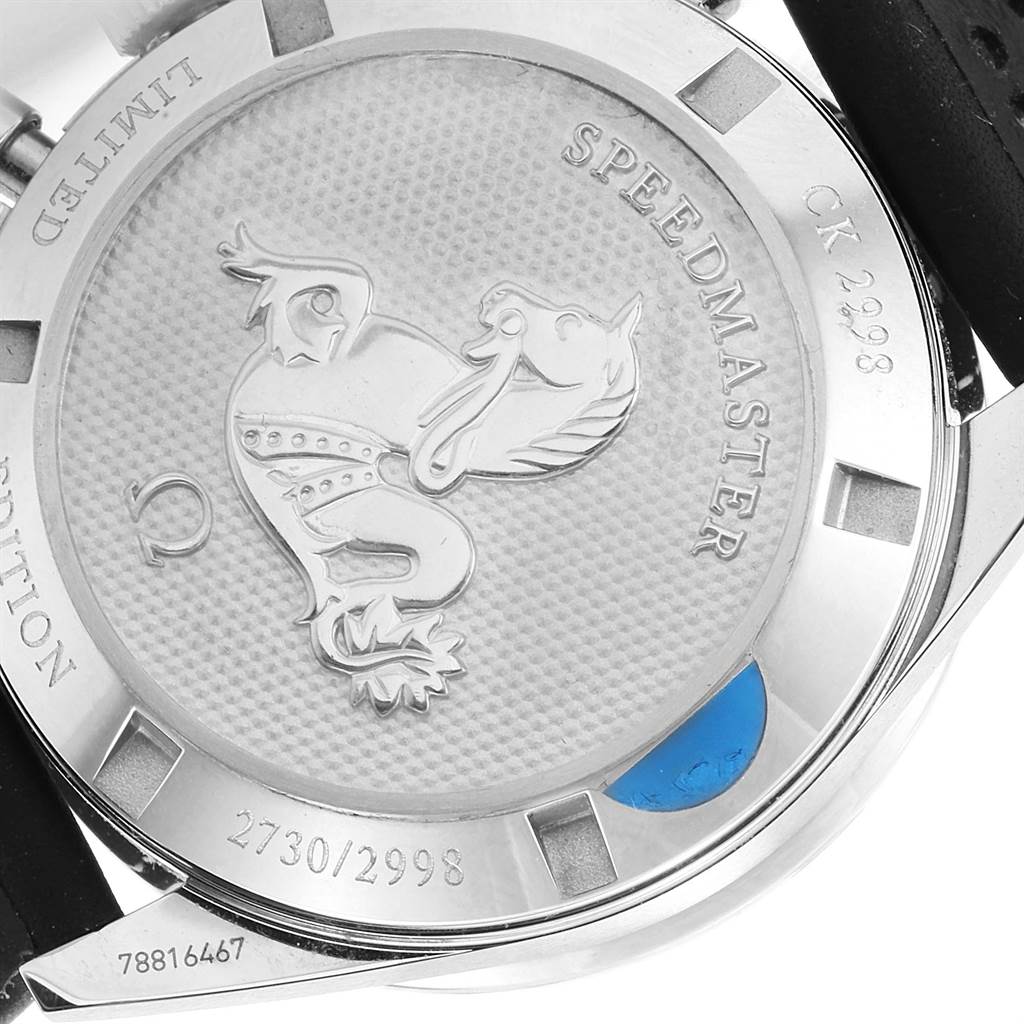 This image shows a close-up view of the case back of an Omega Speedmaster 311.32.40.30.02.001 Men's Stainless Steel Silver Dial 311.32.40.30.02.001 Men's Stainless Steel Silver Dial watch, highlighting the embossed emblem and inscriptions.