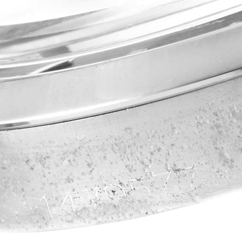 The image shows a close-up angle of the case back and serial number on a Vintage Collection model by Rolex.