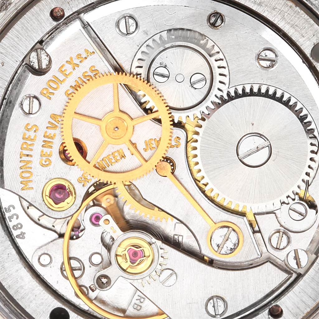 This close-up image shows the intricate internal mechanics of the Rolex Vintage Collection 6694 Men's Stainless Steel Black Dial 6694 Men's Stainless Steel Black Dial model.