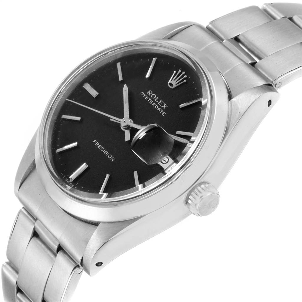 This image shows a Rolex Vintage Collection 6694 Men's Stainless Steel Black Dial 6694 Men's Stainless Steel Black Dial Oysterdate watch viewed at an angle, highlighting the dial, crown, and metal strap.