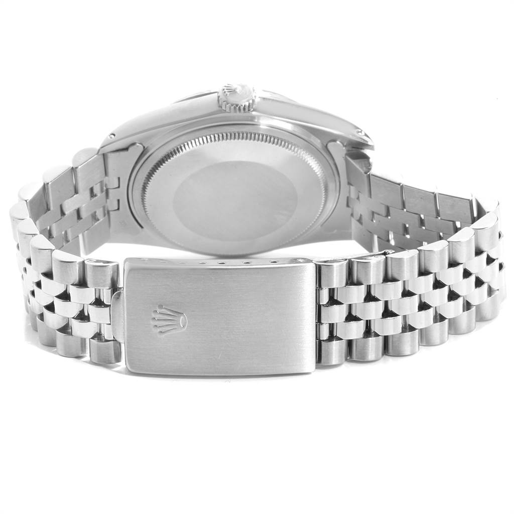 The image shows the back view of the casing and the clasp of the bracelet on a Rolex Vintage Collection 16014 Men's Stainless Steel Silver Dial 16014 Men's Stainless Steel Silver Dial model watch.