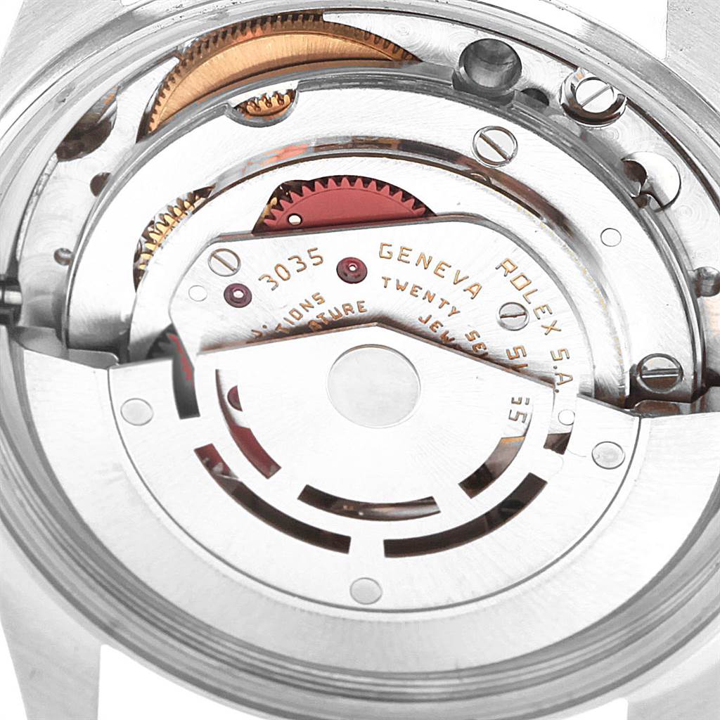 This image shows the internal mechanism of the Rolex Vintage Collection 16013 Men's Stainless Steel Champagne Dial 16013 Men's Stainless Steel Champagne Dial model, viewed from the back with gears and the rotor visible.