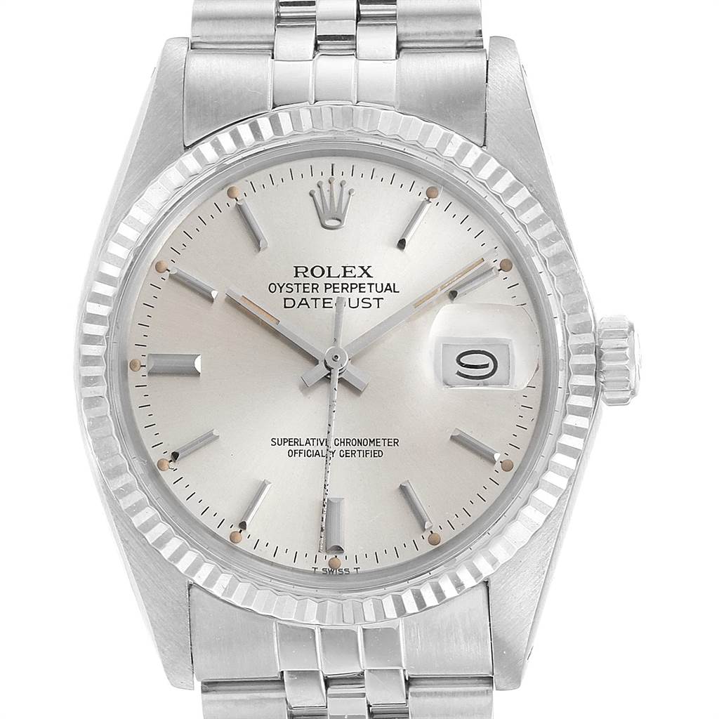 The image shows a frontal view of the Rolex Vintage Collection 16014 Men's Stainless Steel Silver Dial 16014 Men's Stainless Steel Silver Dial Datejust watch, highlighting the dial, fluted bezel, and bracelet.