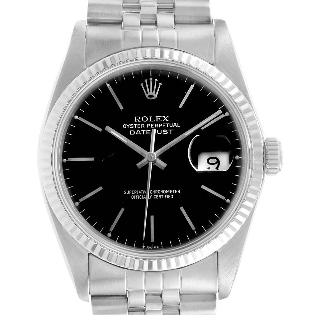 This image shows a front view of a Rolex Oyster Perpetual Datejust from the Vintage Collection, highlighting the black dial and date window.