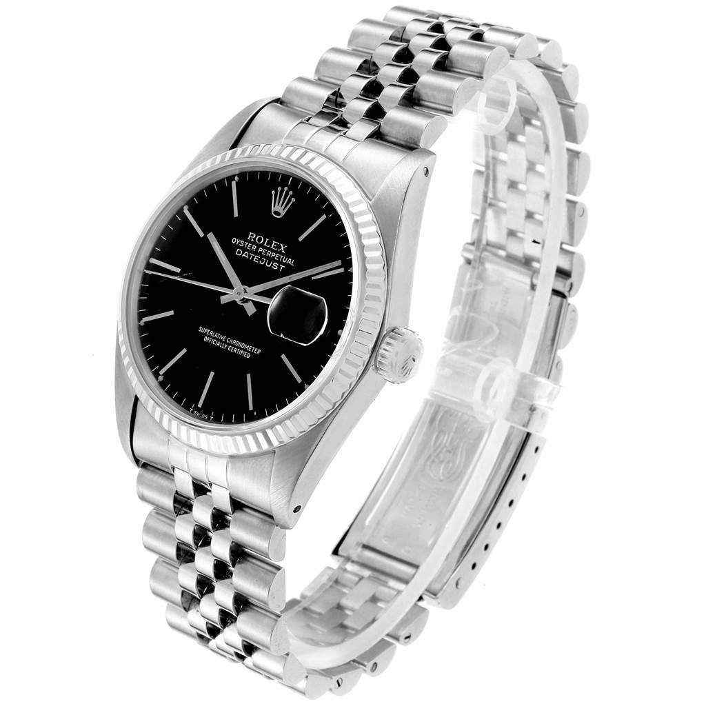 The image shows a Rolex Vintage Collection 16014 Men's Stainless Steel Black Dial 16014 Men's Stainless Steel Black Dial Oyster Perpetual Datejust watch at a three-quarter angle, highlighting its black dial, fluted bezel, and Jubilee bracelet.