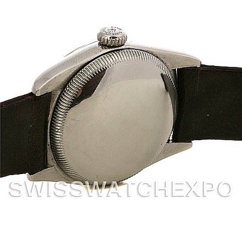 The image shows the back and side of the Rolex Vintage Collection 6050 Stainless Steel Silver Dial 6050 Stainless Steel Silver Dial watch, featuring the case back and crown.