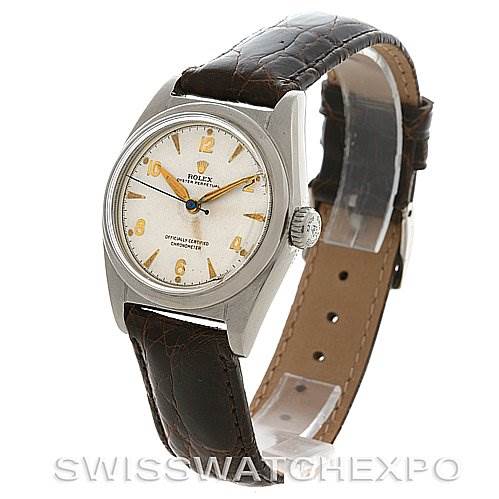 The image shows a Rolex Vintage Collection 6050 Stainless Steel Silver Dial 6050 Stainless Steel Silver Dial watch at a 3/4 angle, highlighting the face, crown, and leather strap.