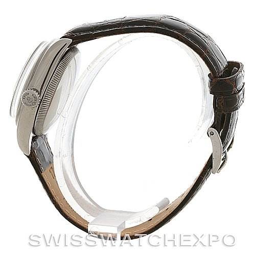 The image shows a side profile of the Vintage Collection model by Rolex, highlighting the watch case, crown, and leather strap.