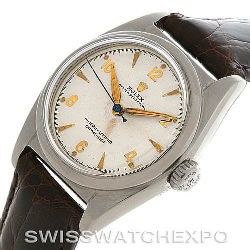 The Rolex Vintage Collection 6050 Stainless Steel Silver Dial 6050 Stainless Steel Silver Dial watch is shown at an angled top view, highlighting the dial, case, and leather strap.