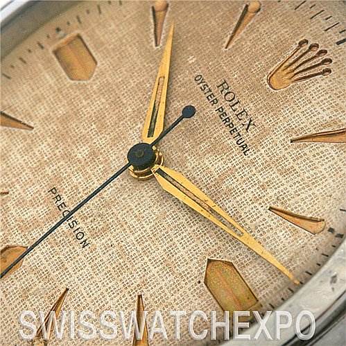 The image shows a close-up view of the dial and hands of the Vintage Collection Rolex Oyster Perpetual watch.
