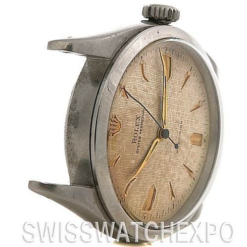 The image shows a side angle of a Rolex Vintage Collection 6298 Stainless Steel Beige Dial 6298 Stainless Steel Beige Dial model watch, highlighting the case, crown, and textured dial.