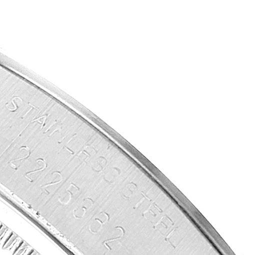 This is a close-up shot of the stainless steel casing with engraved details from a Vintage Collection model by Rolex.