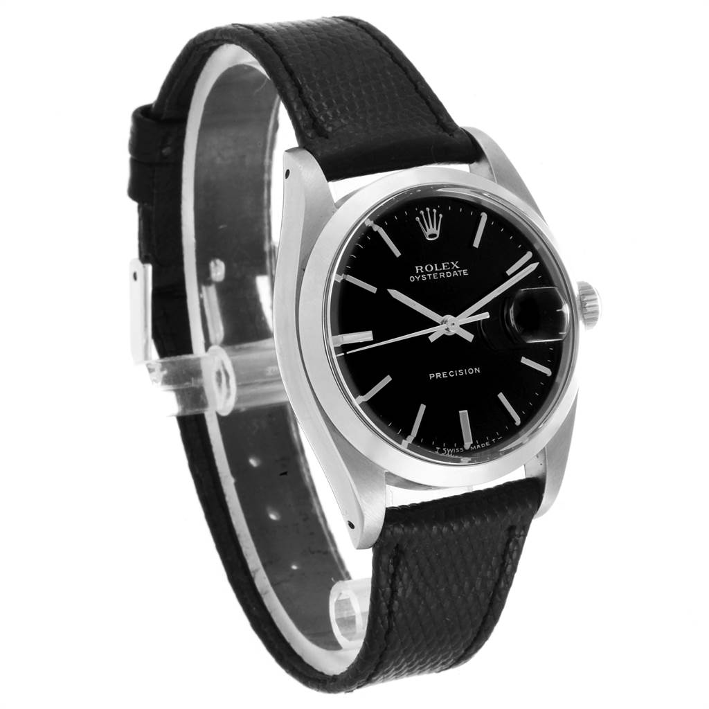 This image shows a side angle view of the Rolex Vintage Collection 6694 Men's Stainless Steel Black Dial 6694 Men's Stainless Steel Black Dial watch, highlighting its black dial, silver casing, and leather strap.