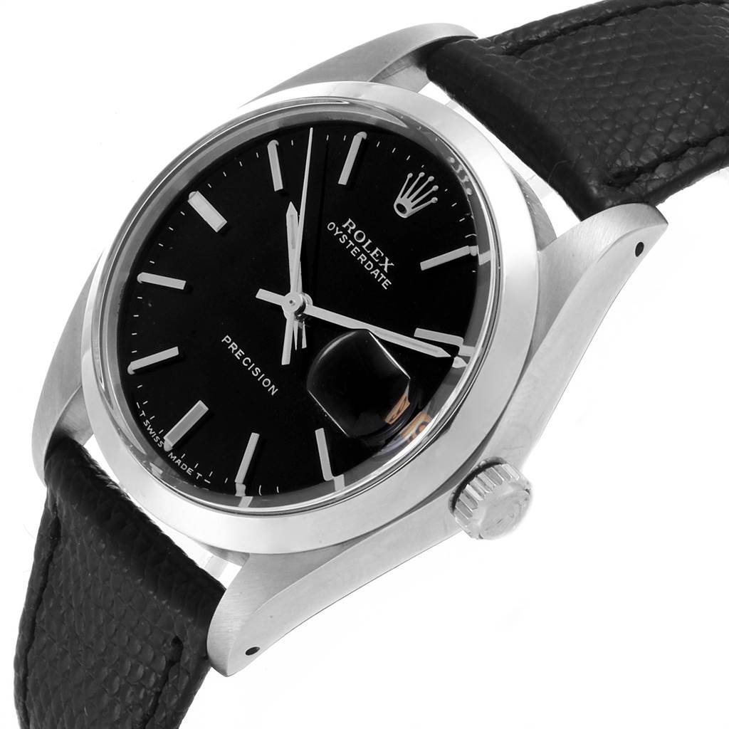 The image shows a detailed side angle of the Rolex Vintage Collection 6694 Men's Stainless Steel Black Dial 6694 Men's Stainless Steel Black Dial watch, highlighting the black dial, crown, and leather strap.