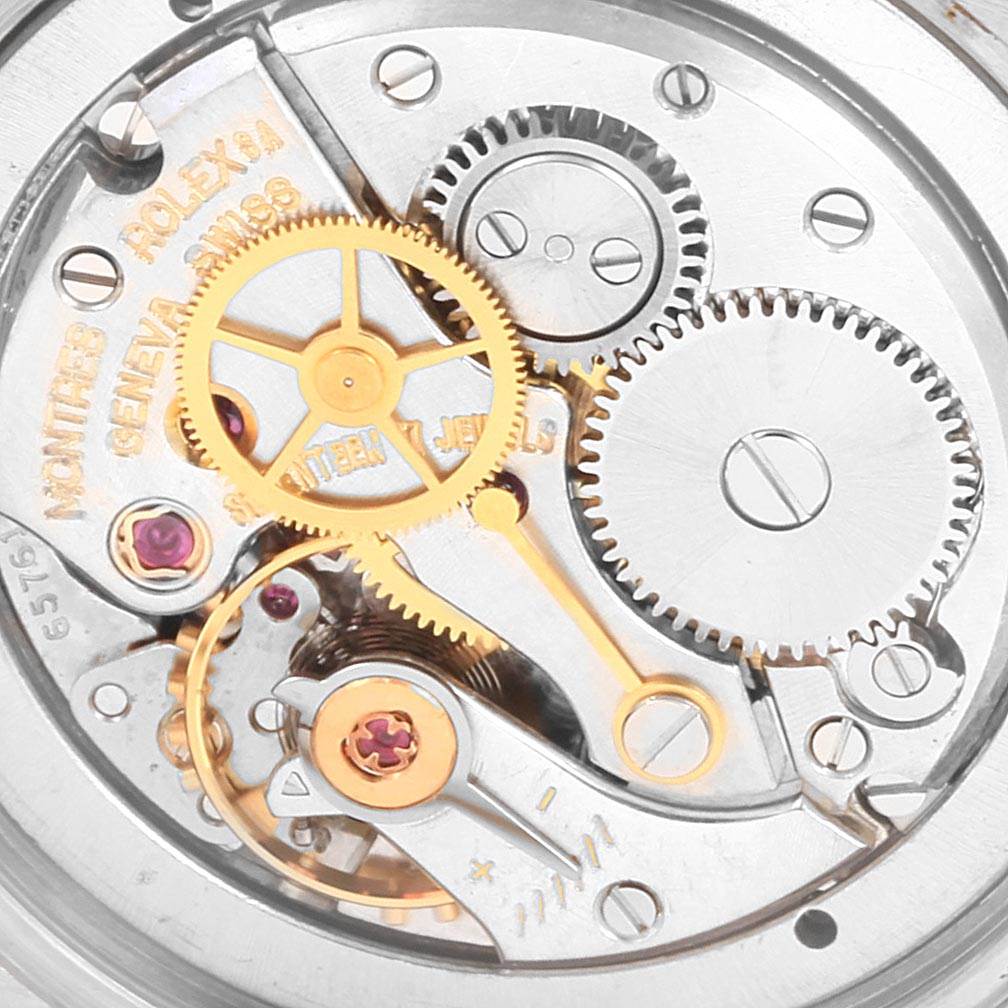 The image shows the inner mechanical components of the Vintage Collection model by Rolex, viewed from the back.