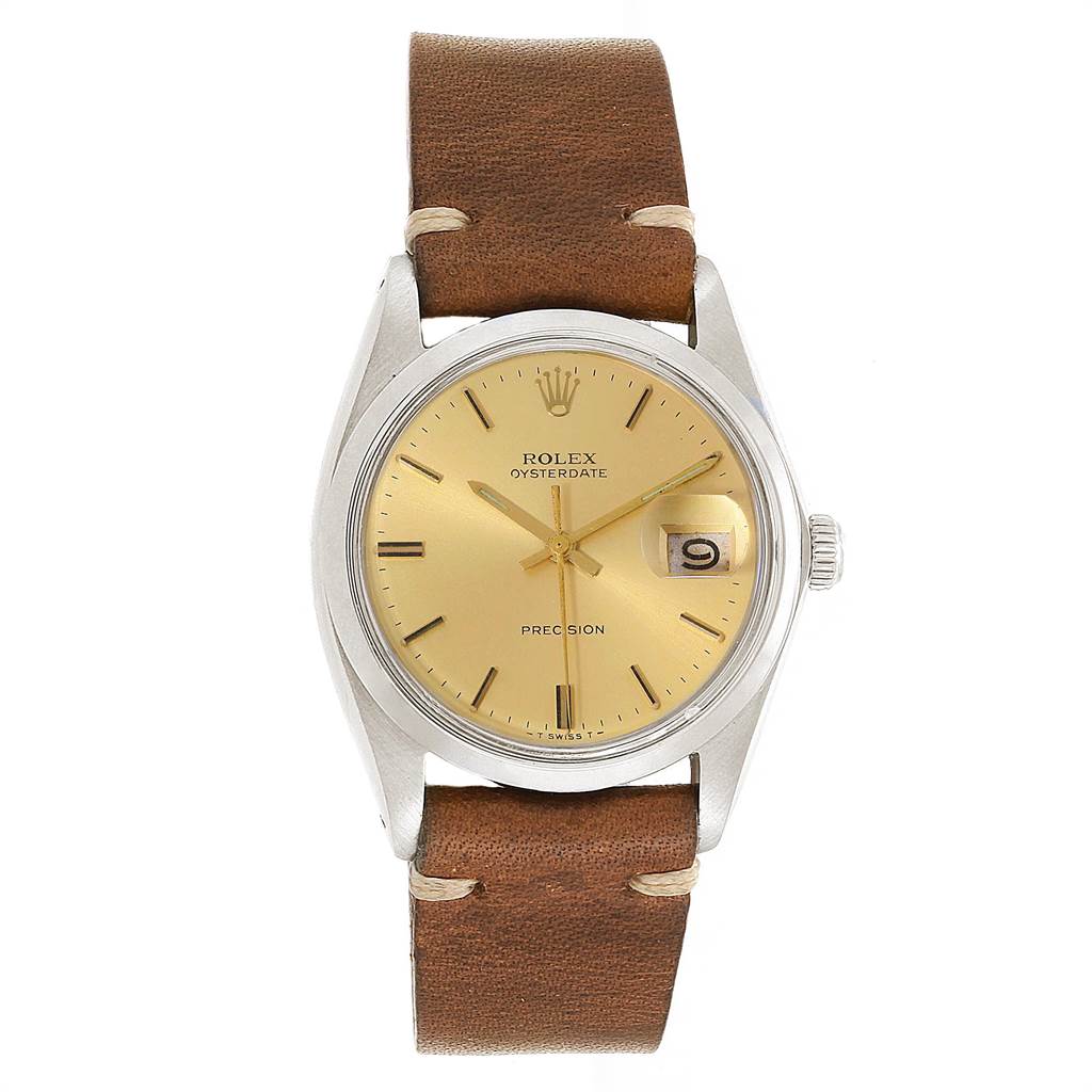 The Rolex Vintage Collection 6694 Men's Stainless Steel Champagne Dial 6694 Men's Stainless Steel Champagne Dial Oysterdate watch is shown from a front angle, displaying its dial, bezel, crown, and leather strap.