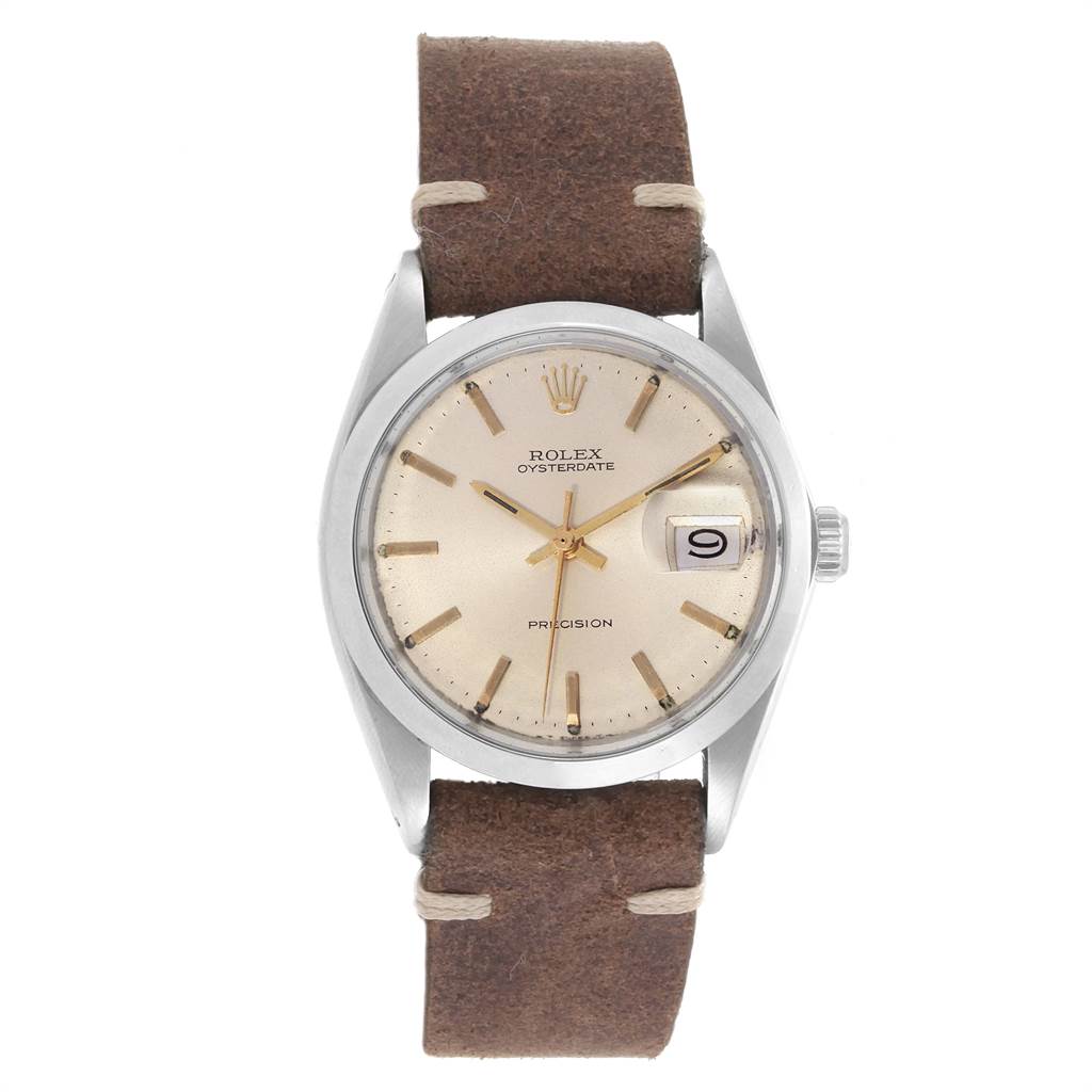 The image shows a front view of a Rolex Vintage Collection 6694 Men's Stainless Steel Silver Dial 6694 Men's Stainless Steel Silver Dial Oysterdate watch with a brown leather strap and date display.