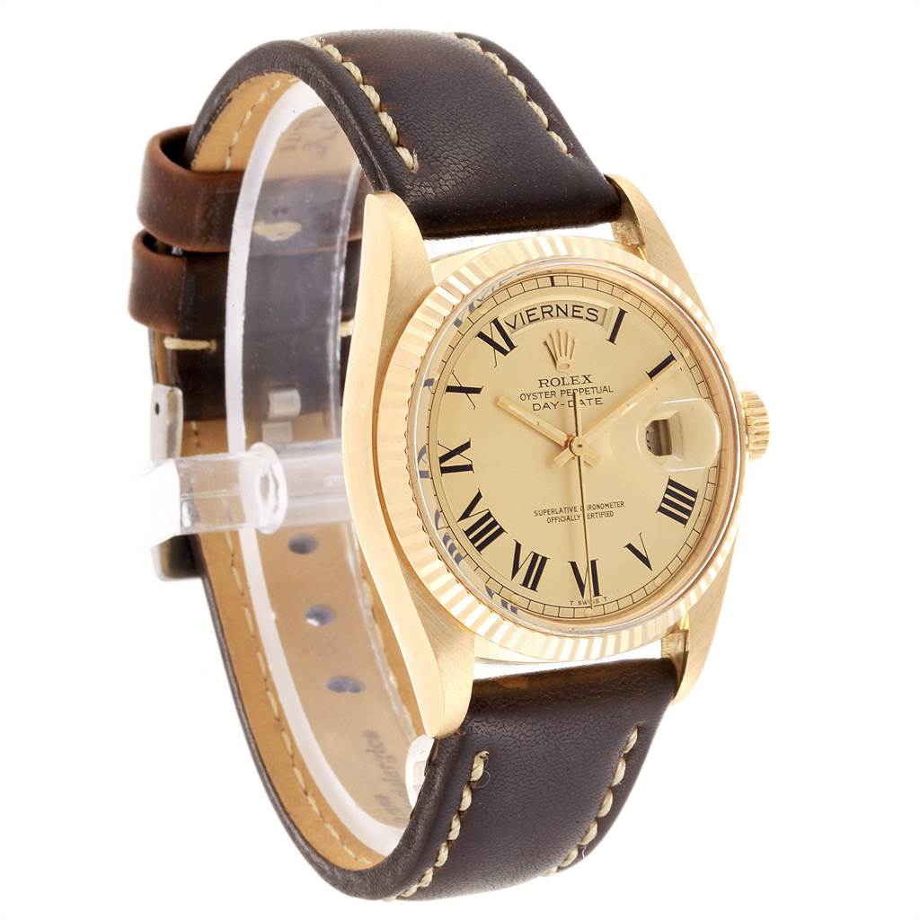 This is a side-angle view of a Rolex Vintage Collection 1803 Men
s Yellow Gold Champagne Dial 1803 Men
s Yellow Gold Champagne Dial watch, showing the dial, leather strap, and crown.