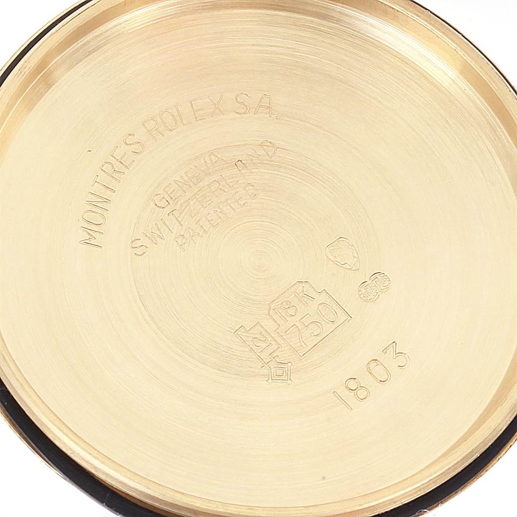 This image shows the inside case back of the Vintage Collection model by Rolex, displaying engravings and hallmarks.