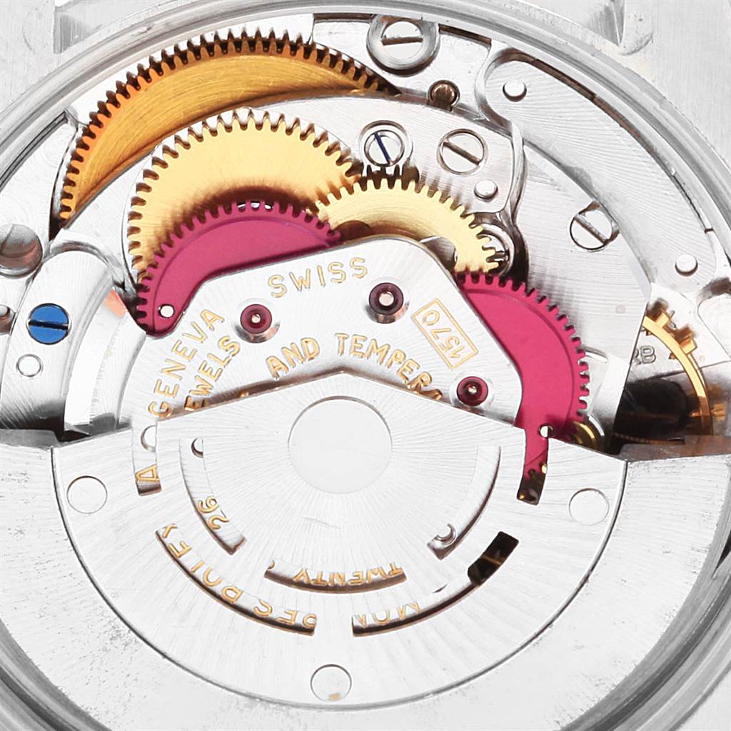 This image shows the intricate internal mechanism of the Rolex Vintage Collection 1500 Men's Stainless Steel Silver Dial 1500 Men's Stainless Steel Silver Dial model, highlighting gears and components.