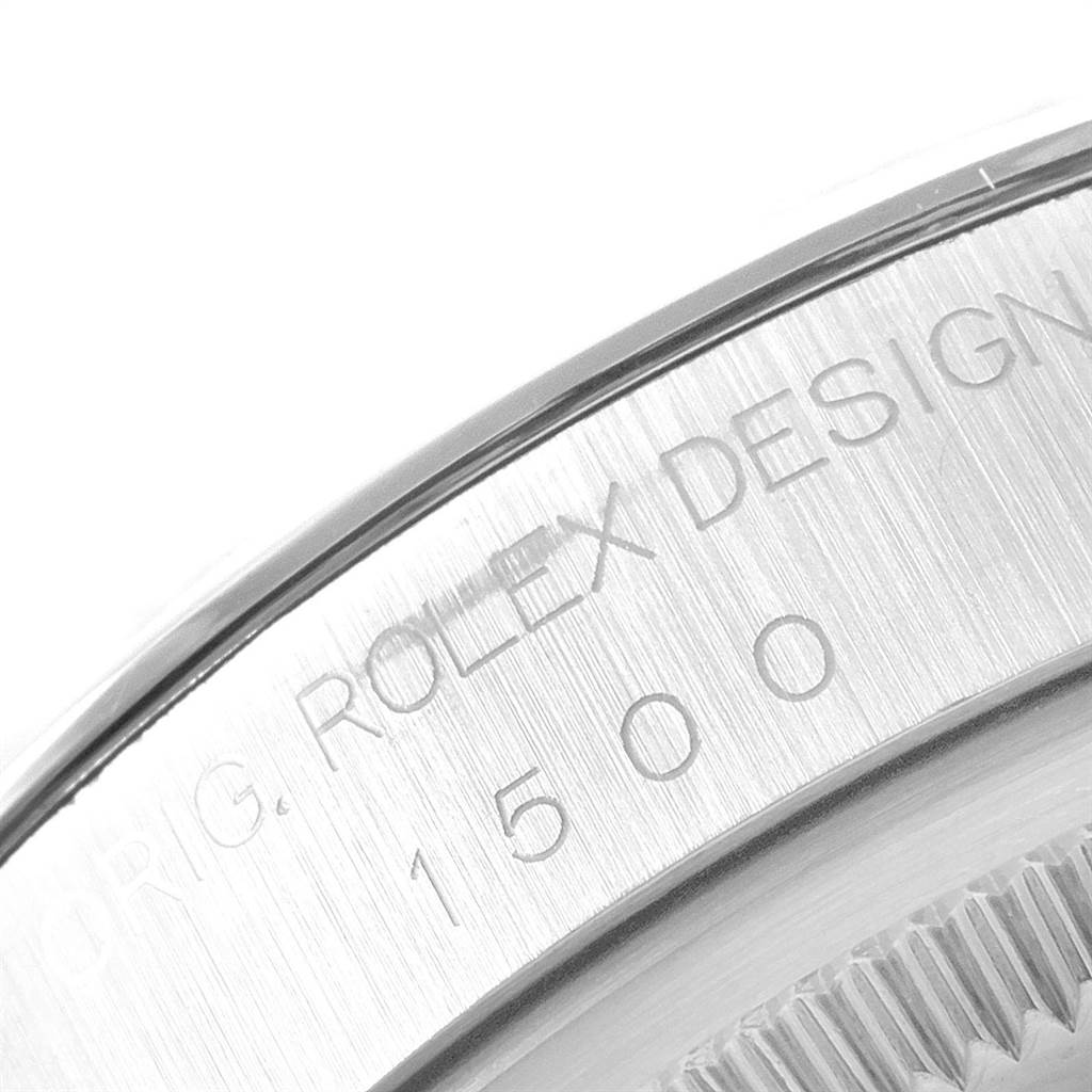 This image shows a close-up of the model number "1500" engraved on the bezel of a Vintage Collection model by Rolex.