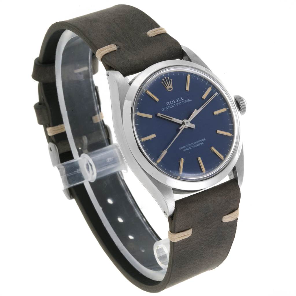 The image shows a side view angle of the Rolex Vintage Collection 1002 Men's Stainless Steel Blue Dial 1002 Men's Stainless Steel Blue Dial watch, featuring its blue dial and leather strap.