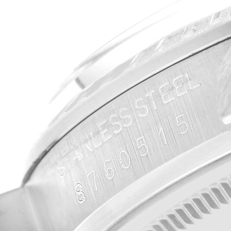 The image shows a close-up of the side of a stainless steel Rolex Vintage Collection 16030 Men's Stainless Steel Grey Dial 16030 Men's Stainless Steel Grey Dial watch case with engraved text.