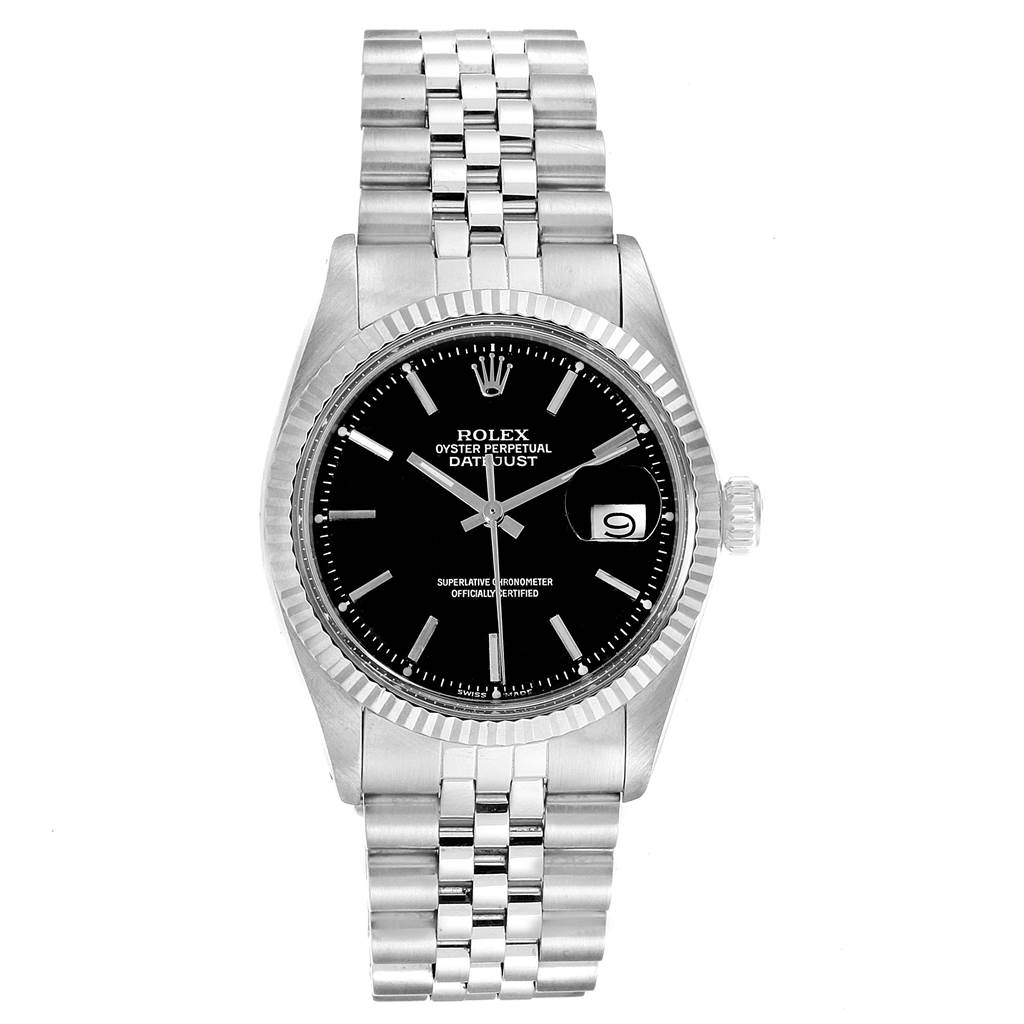 The watch is a Rolex Vintage Collection 1601 Men's Stainless Steel Black Dial 1601 Men's Stainless Steel Black Dial model shown from a top-down angle, displaying its face, bezel, crown, and bracelet.