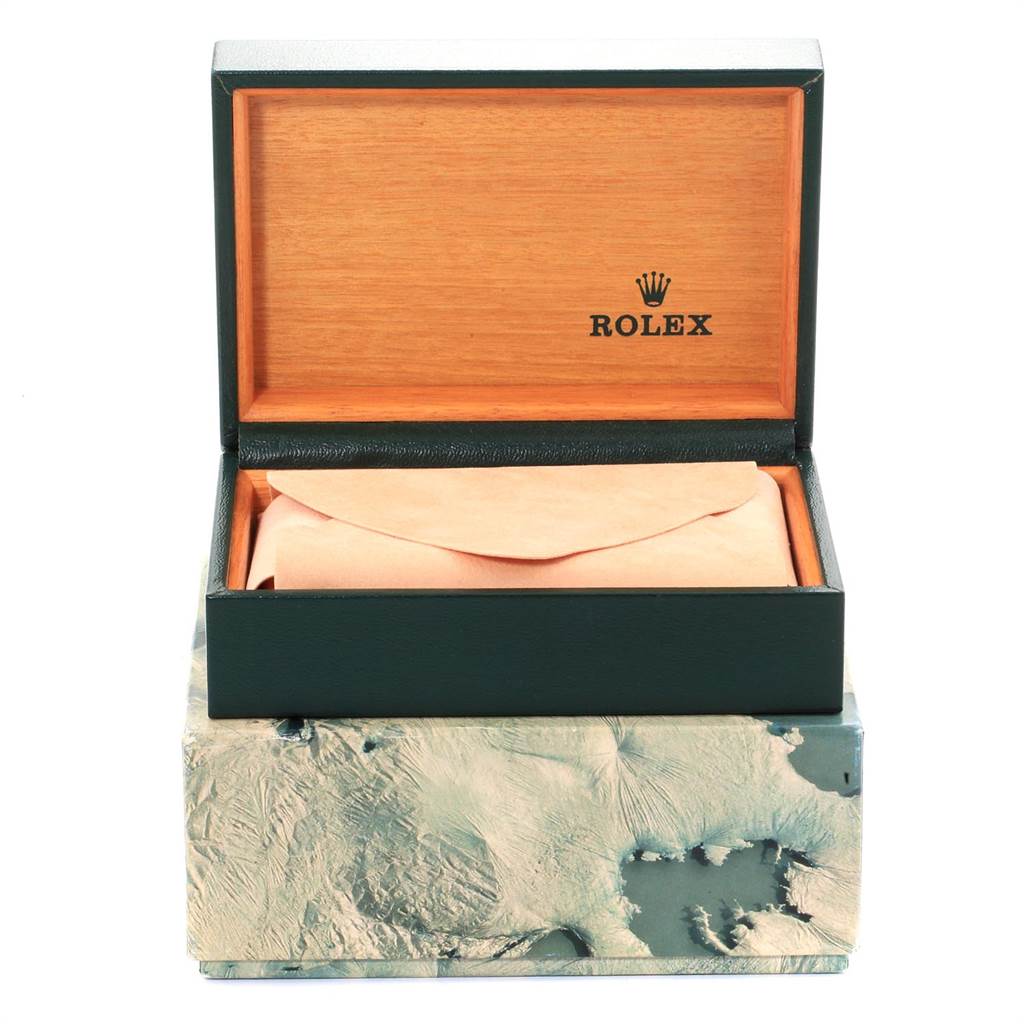 This is an opened Rolex Vintage Collection 1601 Men's Stainless Steel Black Dial 1601 Men's Stainless Steel Black Dial watch box, showing the interior lining and logo.