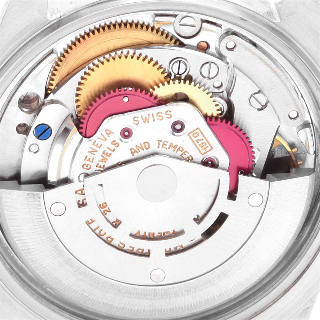 This image shows the intricate internal mechanical movement of a Vintage Collection watch by Rolex, viewed from the back.