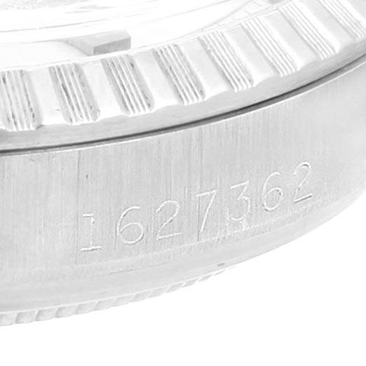 The image shows the side of a Rolex Vintage Collection 1603 Men's Stainless Steel Silver Dial 1603 Men's Stainless Steel Silver Dial watch case, displaying the serial number.