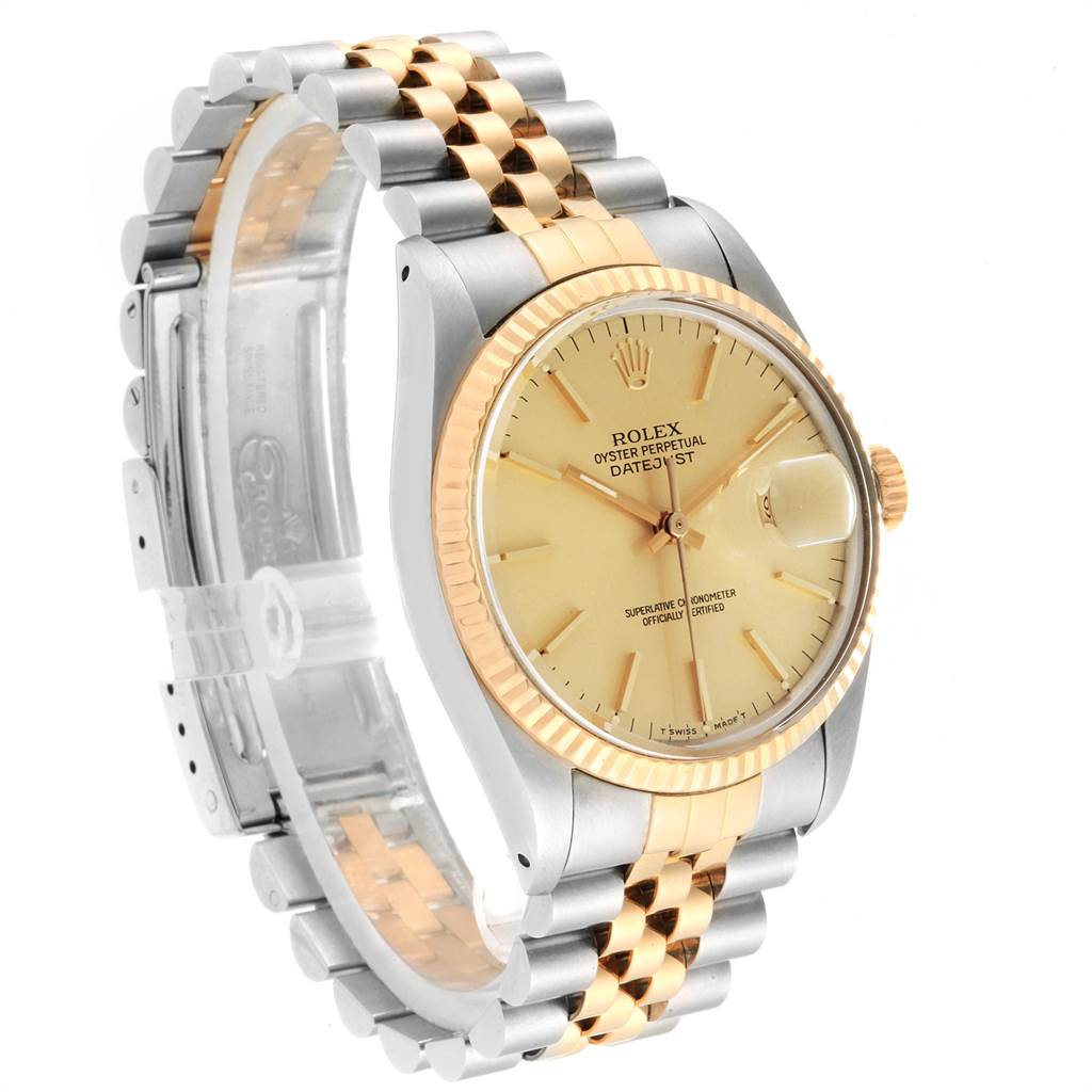 The Rolex Vintage Collection 16013 Men's Stainless Steel Champagne Dial 16013 Men's Stainless Steel Champagne Dial watch is photographed at an angle, showing the face, bezel, and two-tone bracelet.