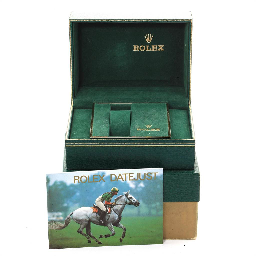 The image shows a green Rolex Vintage Collection 16013 Men's Stainless Steel Champagne Dial 16013 Men's Stainless Steel Champagne Dial watch box with a Rolex Datejust booklet.
