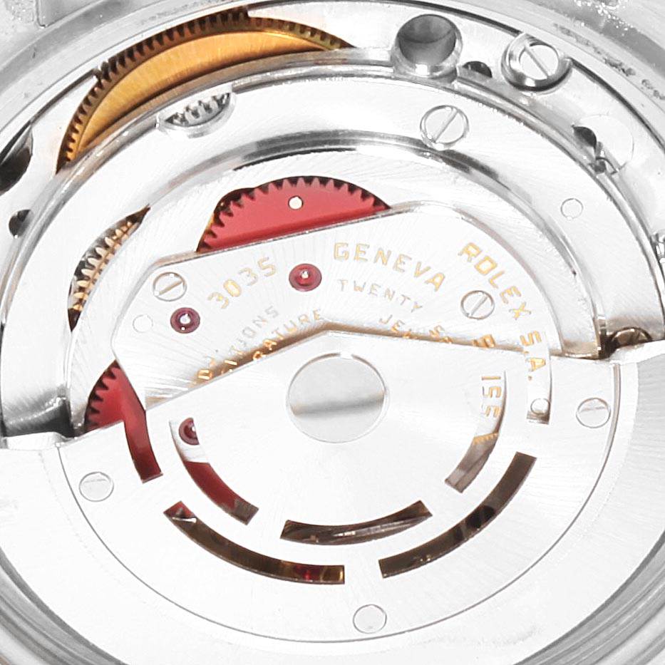 This image shows a close-up of the Rolex Vintage Collection 16013 Men's Stainless Steel Champagne Dial 16013 Men's Stainless Steel Champagne Dial model's internal mechanical movement.