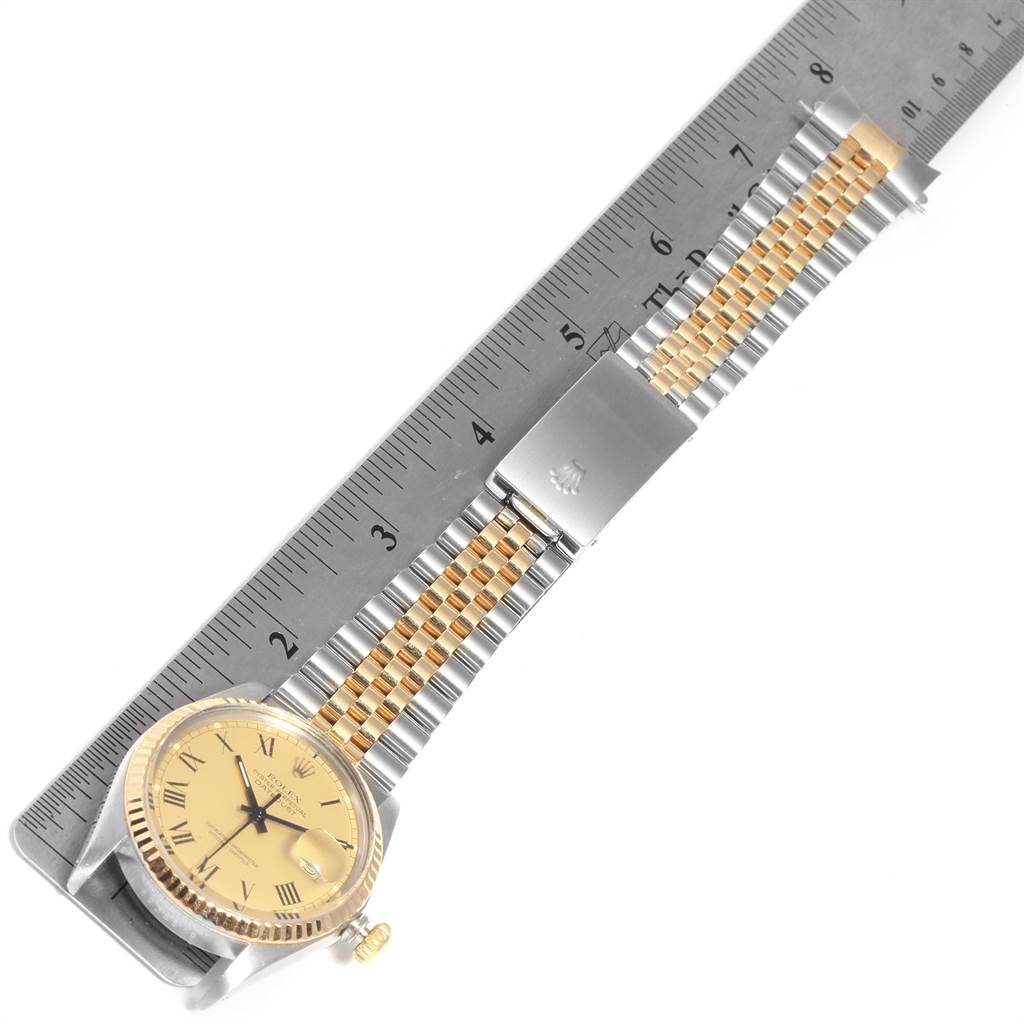 The image shows a Rolex Vintage Collection 16013 Men's Stainless Steel Champagne Dial 16013 Men's Stainless Steel Champagne Dial watch with a two-tone Jubilee bracelet and the ruler indicates the length.