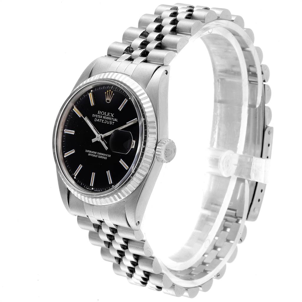 This image shows a side angle of the Rolex Vintage Collection 1601 Men's Stainless Steel Black Dial 1601 Men's Stainless Steel Black Dial Datejust watch, highlighting the black dial, fluted bezel, and Jubilee bracelet.