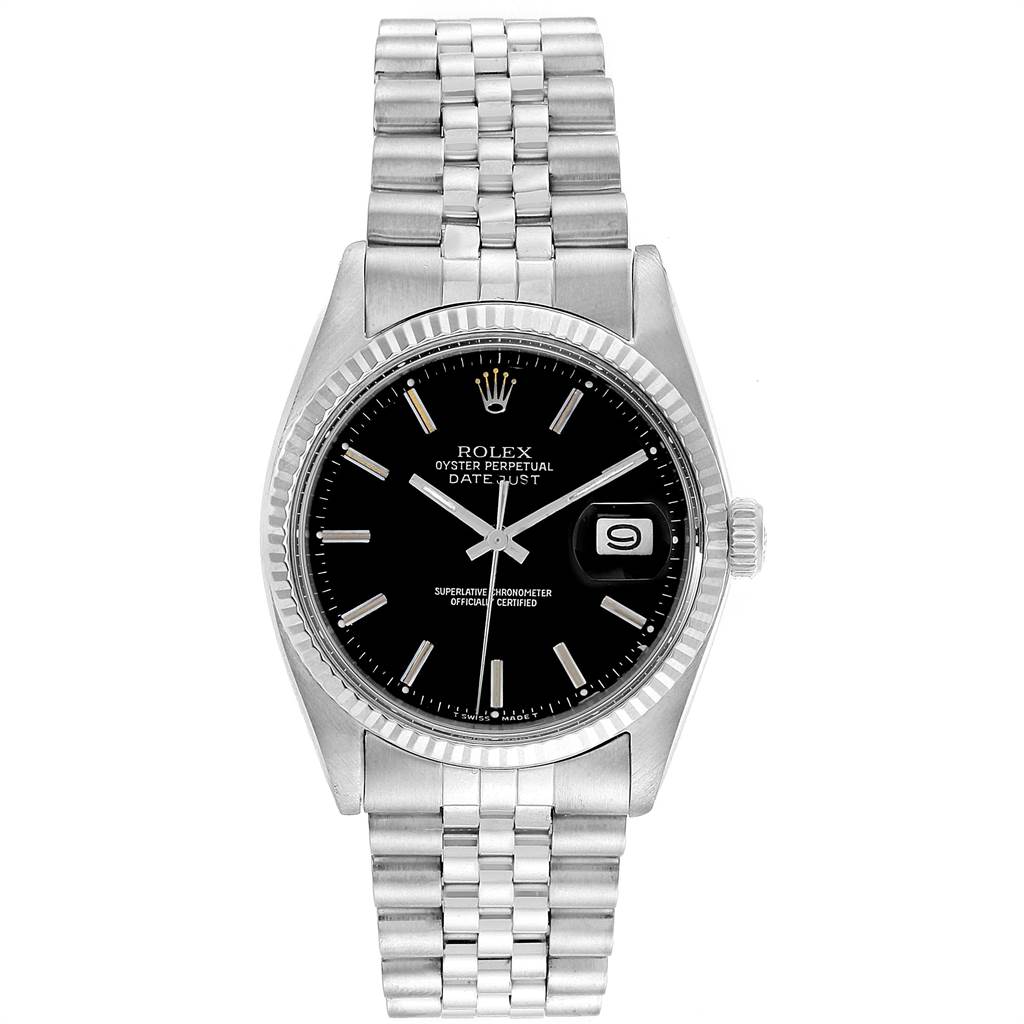 The image shows a frontal view of the Rolex Vintage Collection 1601 Men's Stainless Steel Black Dial 1601 Men's Stainless Steel Black Dial Datejust watch, displaying its black dial, date feature, and metallic bracelet.