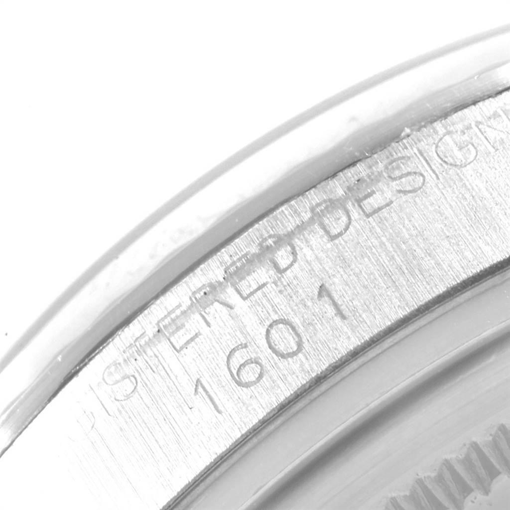This close-up image shows the inner bezel and engraved model number "1601" of a Rolex Vintage Collection 1601 Men's Stainless Steel Black Dial 1601 Men's Stainless Steel Black Dial watch.