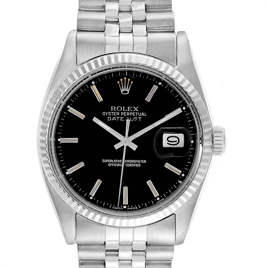 The image shows a frontal view of the Rolex Vintage Collection 1601 Men's Stainless Steel Black Dial 1601 Men's Stainless Steel Black Dial Datejust watch, displaying its dial, hands, and date window.