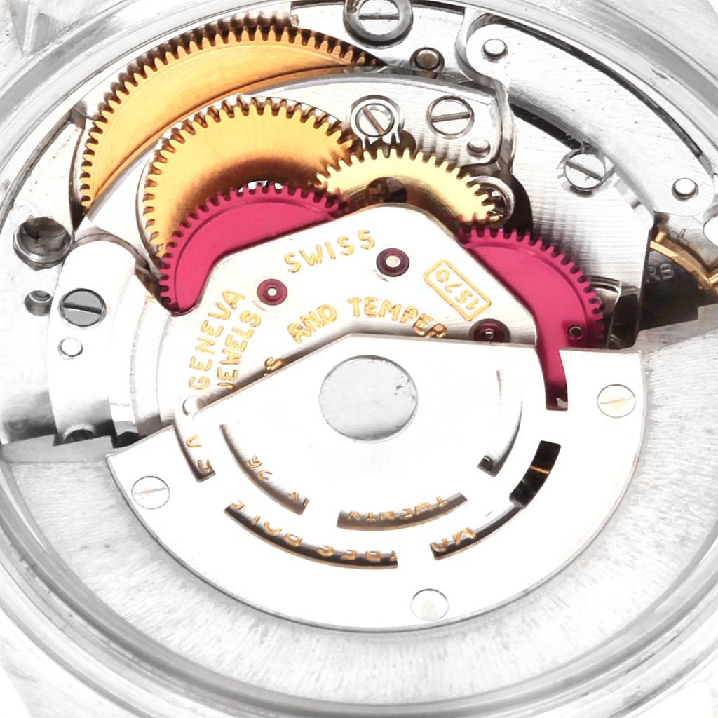 This image shows the intricate mechanical movement parts of a Rolex Vintage Collection 1601 Men's Stainless Steel Black Dial 1601 Men's Stainless Steel Black Dial model watch.