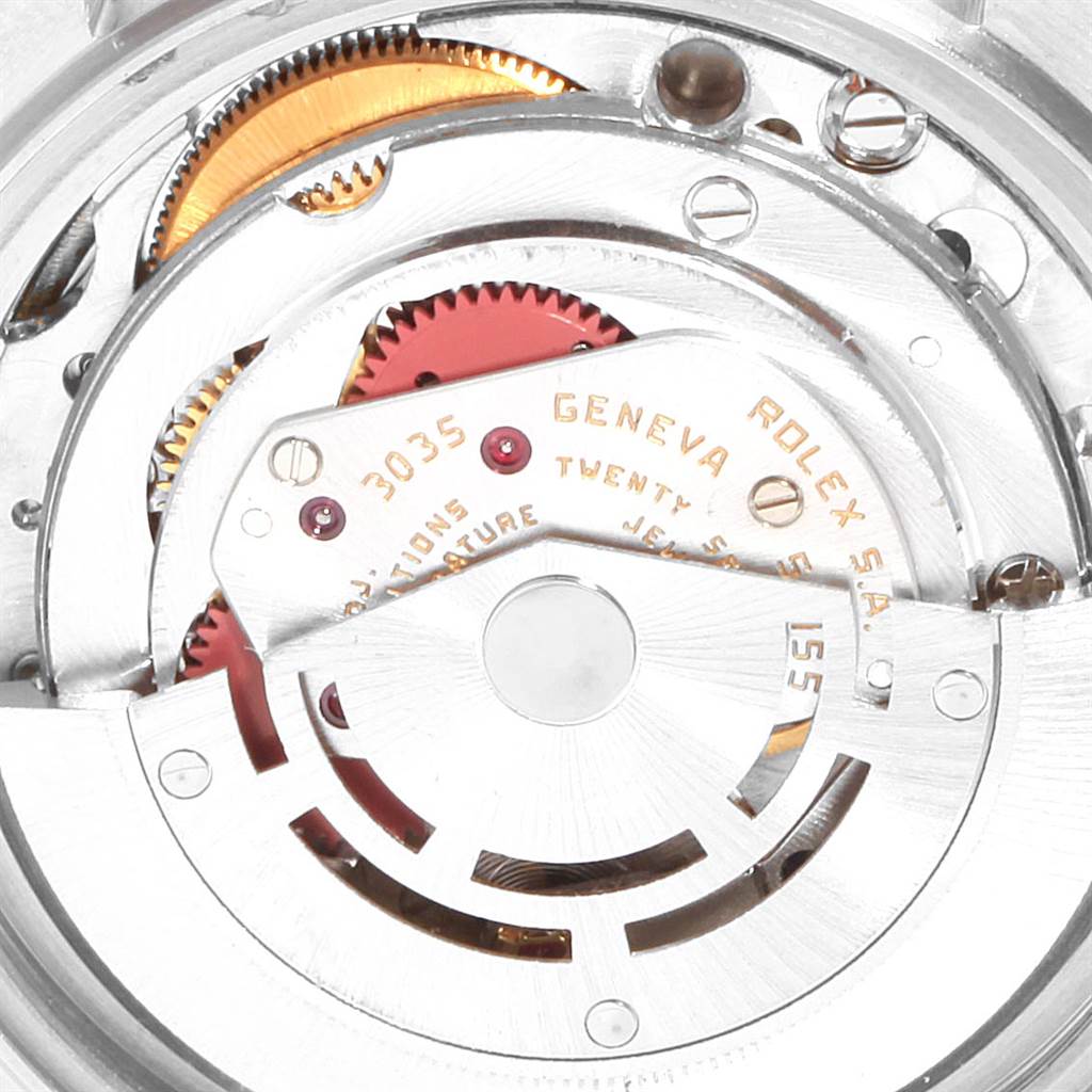 This image shows the inner mechanism of a Rolex Vintage Collection 16013 Men's Stainless Steel Champagne Dial 16013 Men's Stainless Steel Champagne Dial watch, focusing on the movement parts and gears.