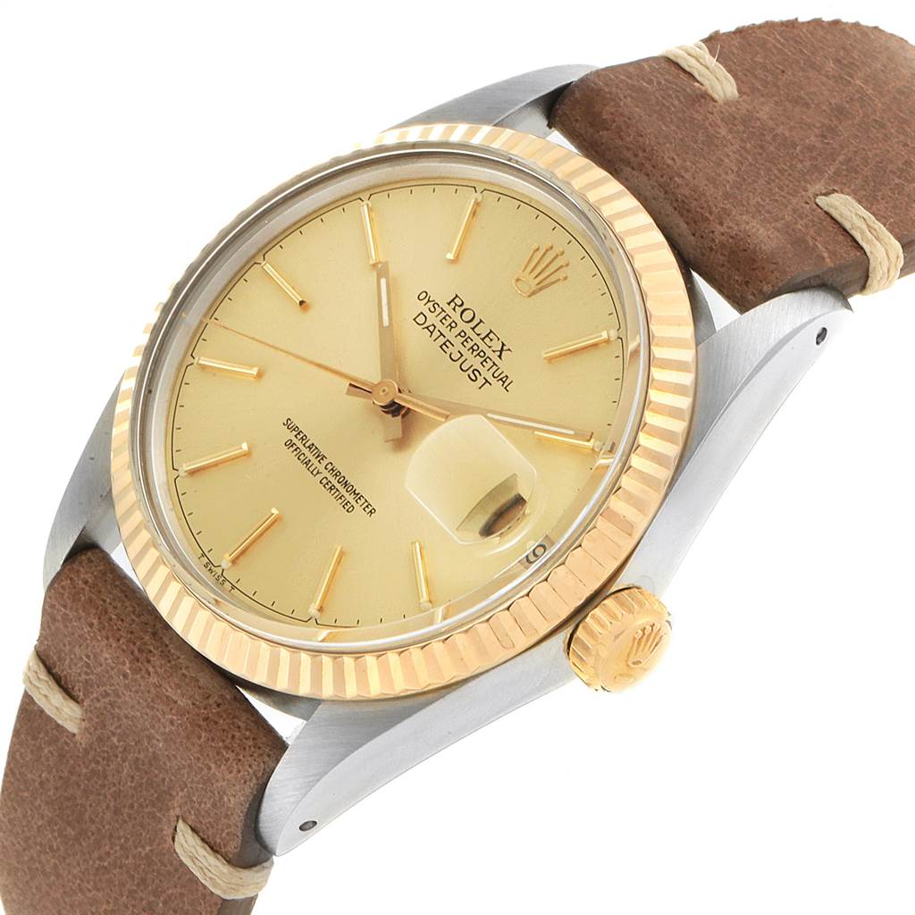 This image shows a Rolex Vintage Collection 16013 Men's Stainless Steel Champagne Dial 16013 Men's Stainless Steel Champagne Dial Oyster Perpetual Datejust watch, featuring a beige dial, fluted bezel, and brown leather strap.
