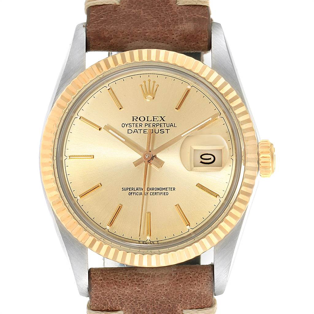 The Rolex Vintage Collection 16013 Men's Stainless Steel Champagne Dial 16013 Men's Stainless Steel Champagne Dial model is shown from a front angle, highlighting the dial, hands, bezel, and part of the leather strap.