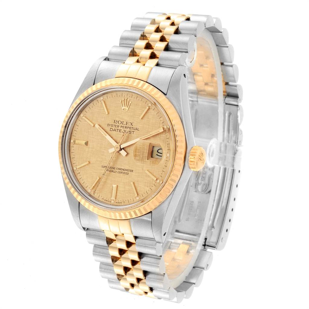 The image shows a Rolex Vintage Collection 16013 Men's Stainless Steel Champagne Dial 16013 Men's Stainless Steel Champagne Dial Datejust watch, featuring a two-tone gold and silver band, viewed from a slight angle.