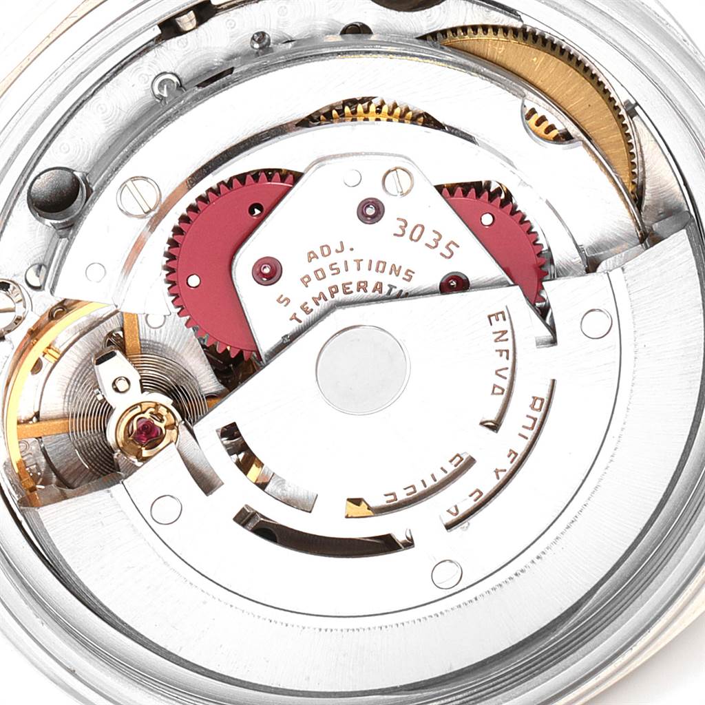 This image shows a close-up of the internal movement and gears of a Rolex Vintage Collection 16014 Men's Stainless Steel Silver Dial 16014 Men's Stainless Steel Silver Dial model watch.