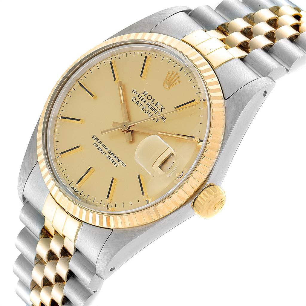 The Rolex Vintage Collection 16013 Men's Steel and Gold (two tone) Champagne Dial 16013 Men's Steel and Gold (two tone) Champagne Dial watch is shown at a three-quarter angle, displaying its gold bezel, dial, date window, and Jubilee bracelet.